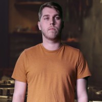 Brandon Ebner Young man with light brown hair and facial hair